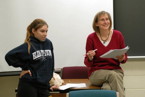 susan mapp with student in front of classroom