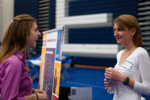 job fair two females talking job fair two females talking