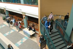 students walking down stairs at lunch time