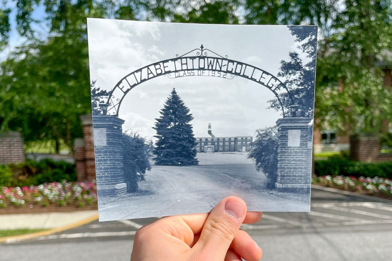 person holding photo of gate