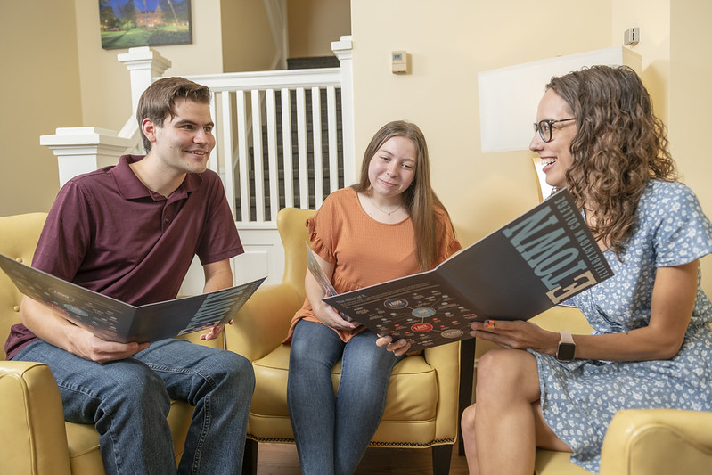 admissions counselor with student