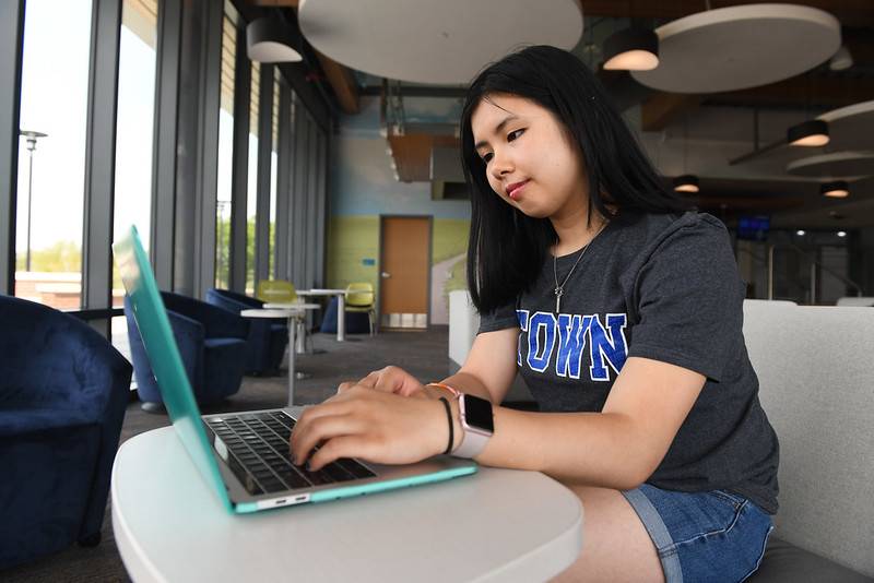 student working on a computer