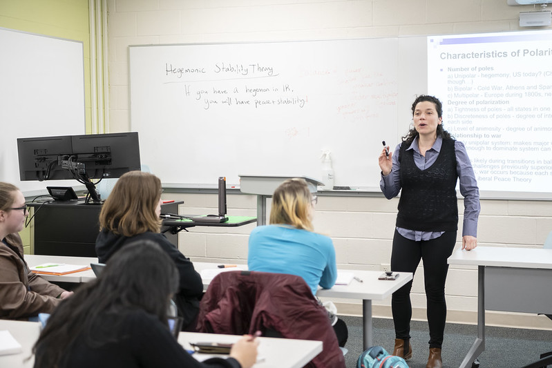 international studies professor teaching in front of class