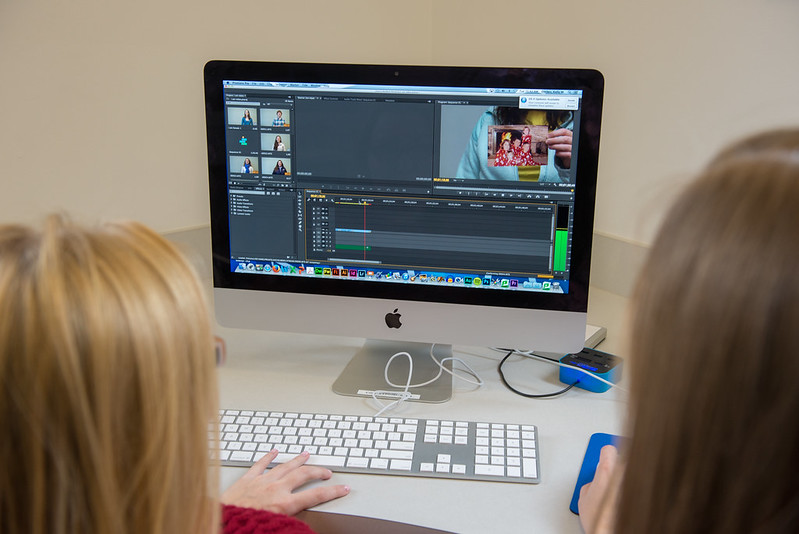 students editing video