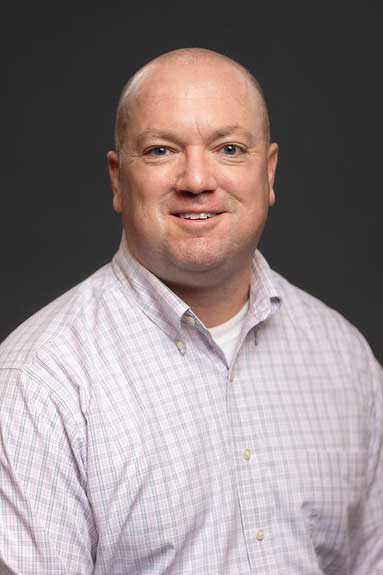 Portrait of Dr. Kevin Peters, Assistant Teaching Professor in Education