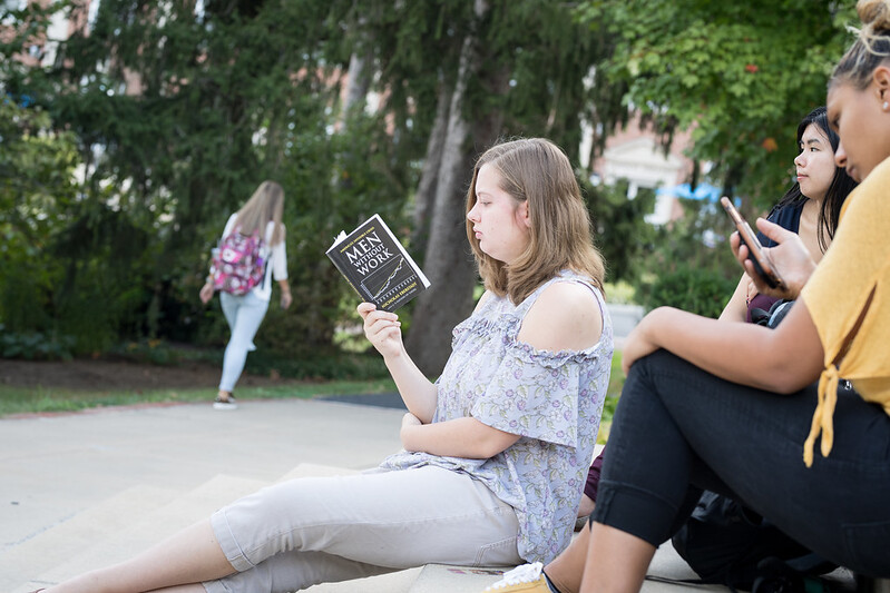 student reading a book