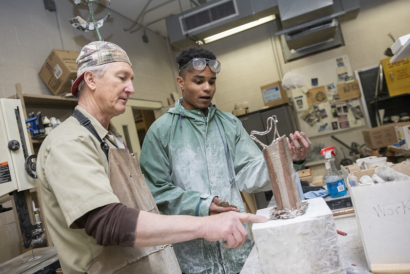 student-and-professor-carving