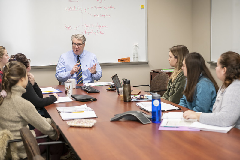 professor teaching in front of class