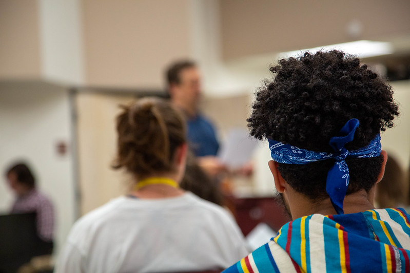 student in music class