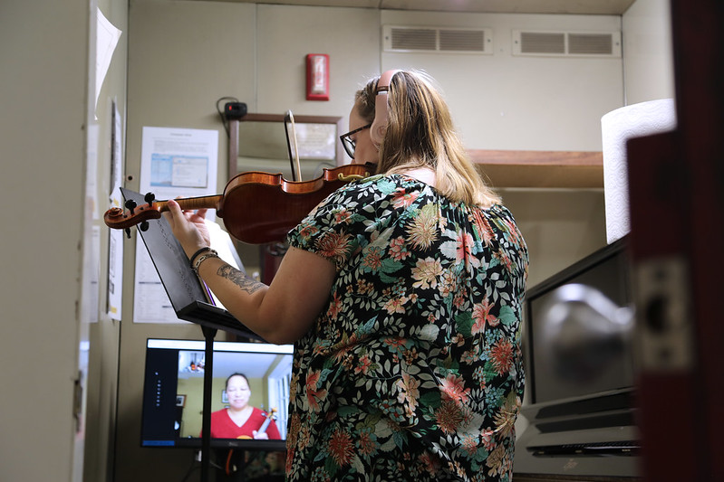student playing violin