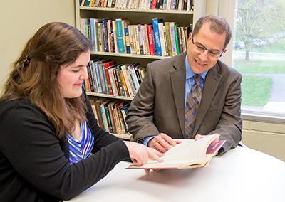 Professor Kanagy working with a student