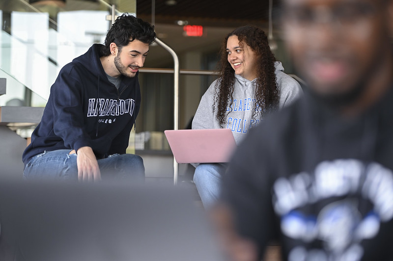 students sitting in bowers