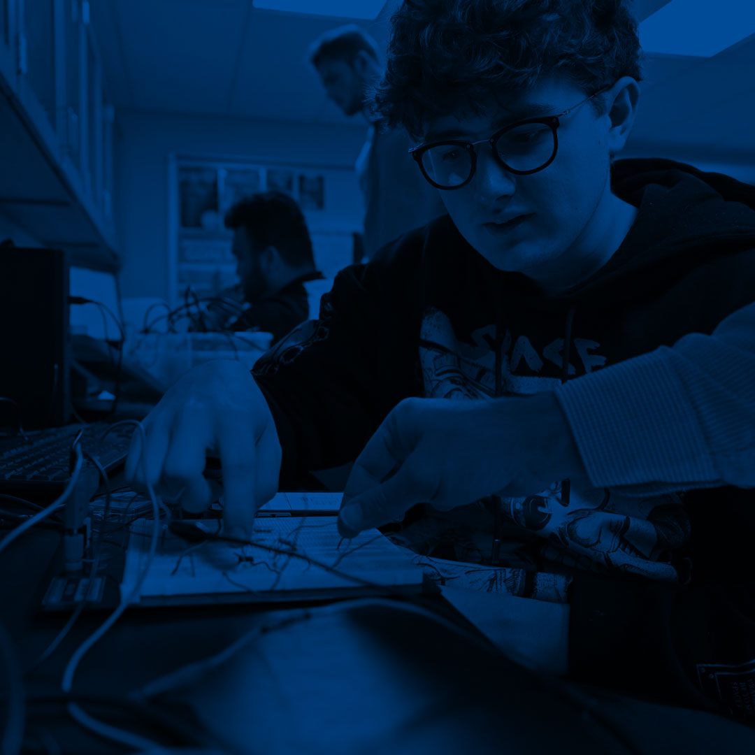 student working with plants