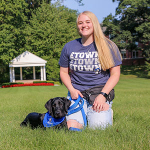 student and dog