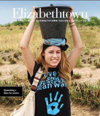 cover image of winter 2013 magazine with girl carrying bucket on her head