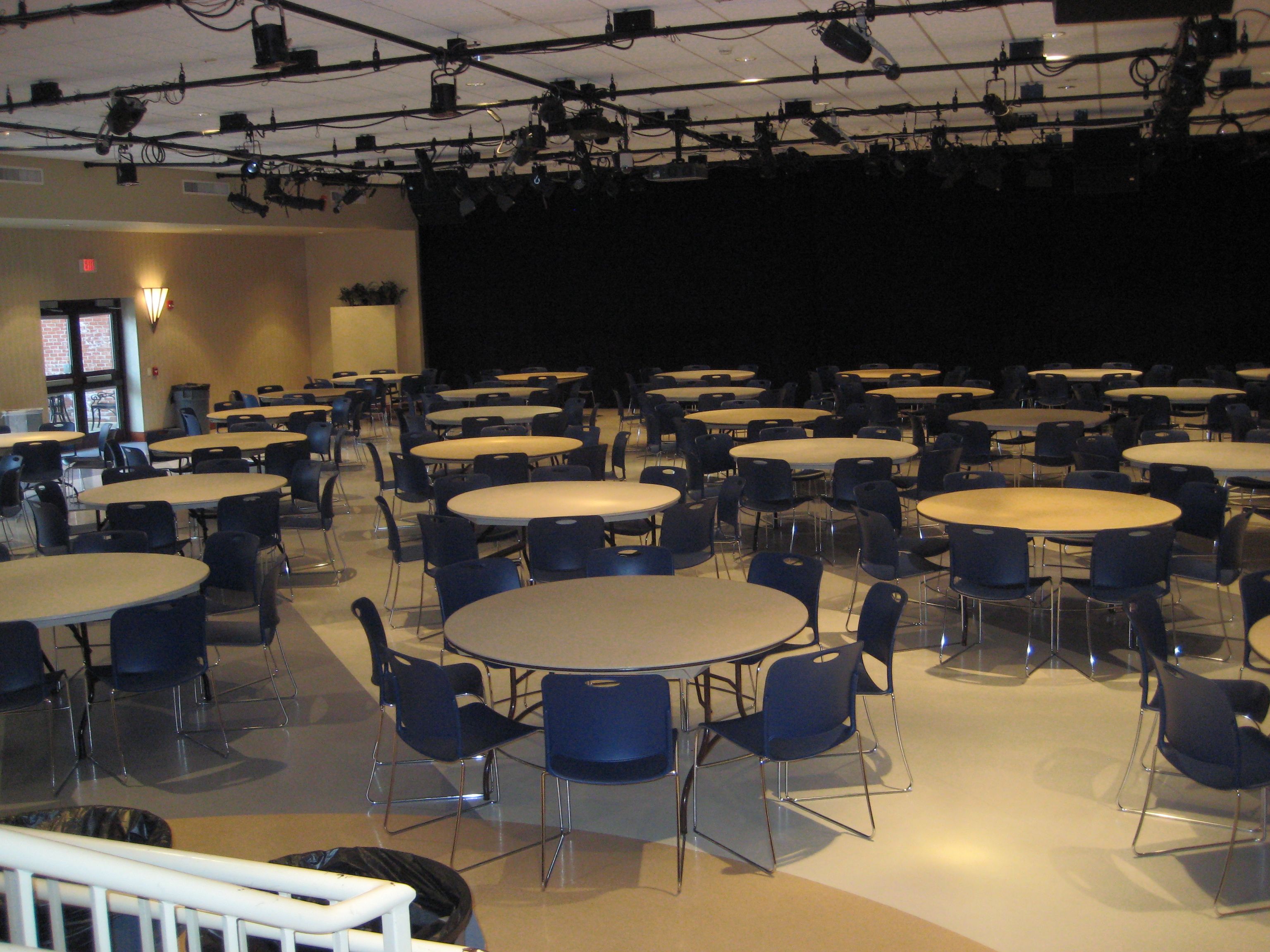 the kav set up for a banquet with round tables
