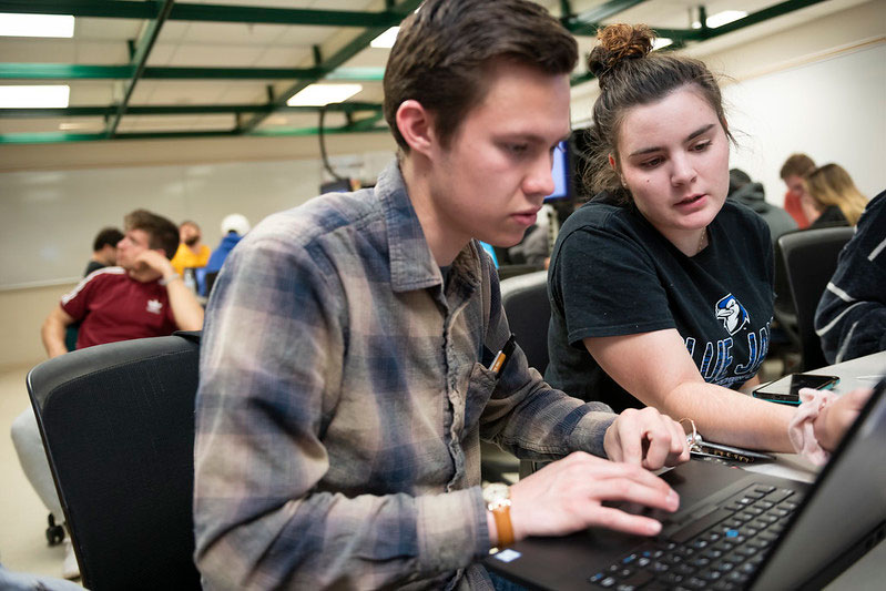 students working on computer