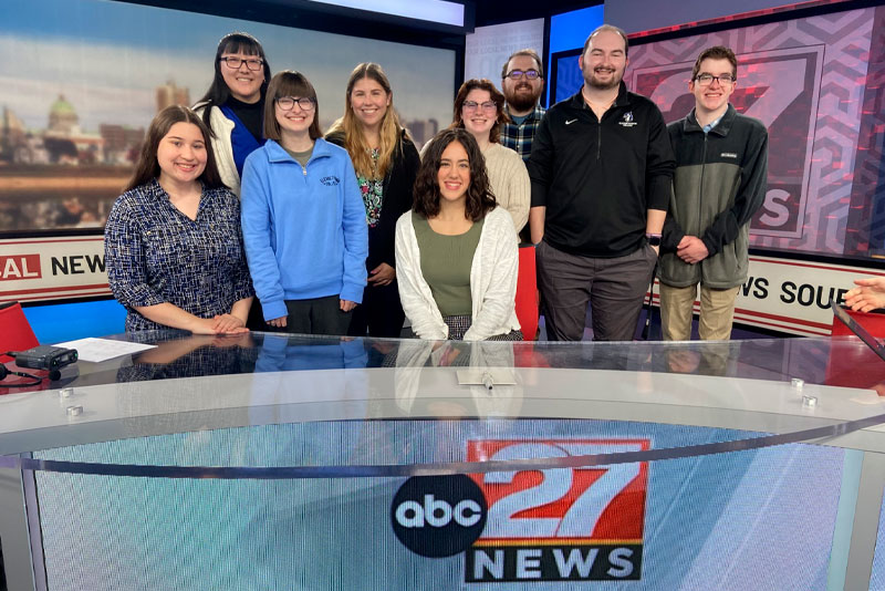 student in news station